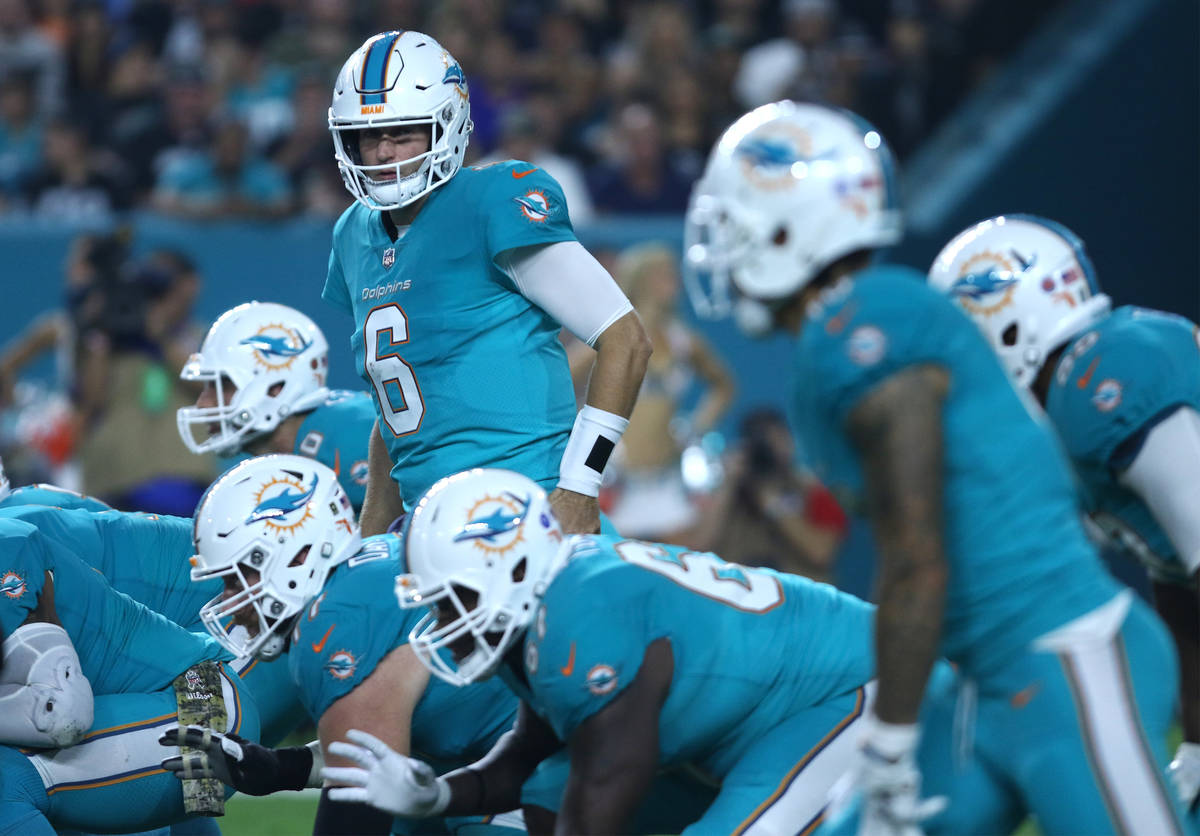 Miami Dolphins quarterback Jay Cutler (6) on the line of scrimmage during the first half of the ...