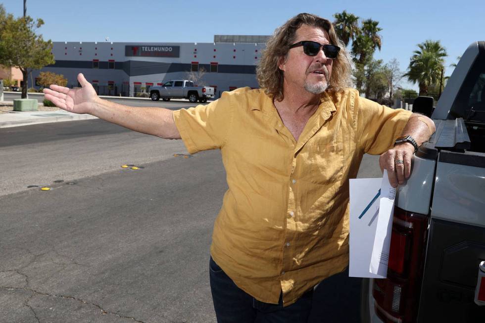 Bruce Familian is interviewed in front of his former property at the intersection of Teco Avenu ...