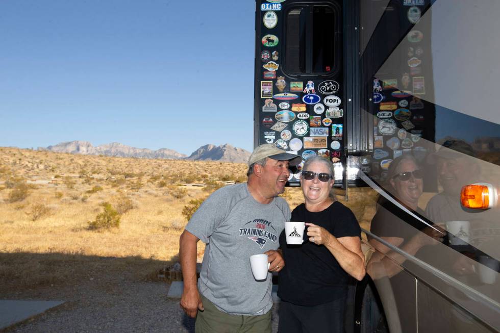 Louis DeSantis and Diane DeSantis, of Massachusetts, enjoy a cup of coffee during their cross-c ...