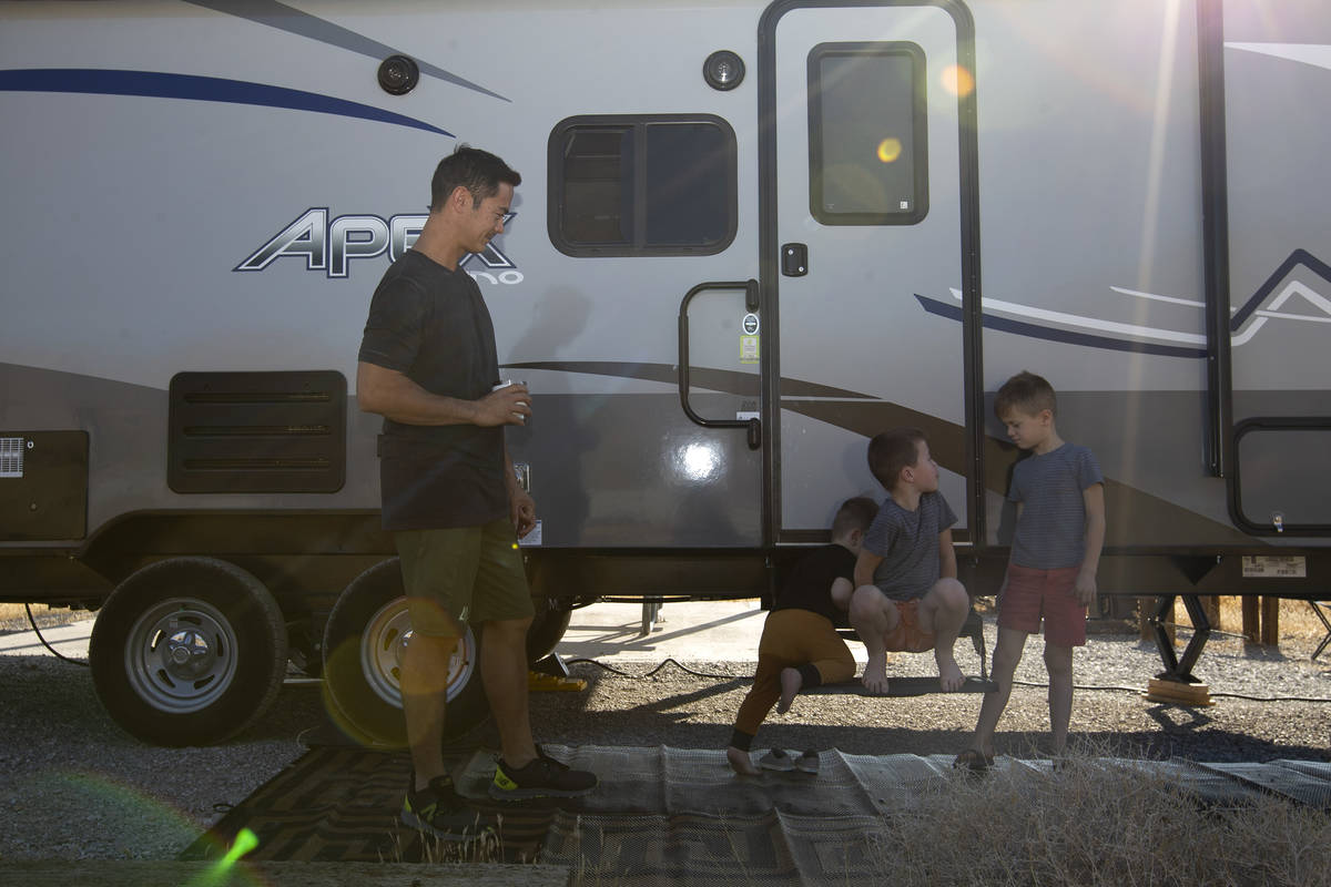 Michael Brewer, a pilot at Nellis Airforce Base, spends time with his three sons before a two-w ...
