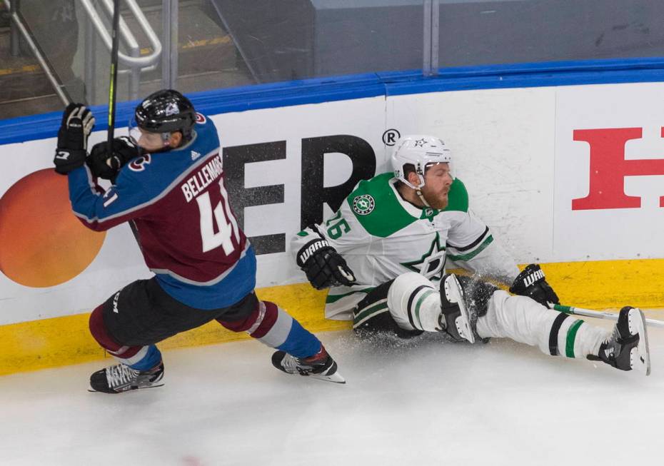 Colorado Avalanche right wing Pierre-Edouard Bellemare (41) checks Dallas Stars' Joe Pavelski ( ...