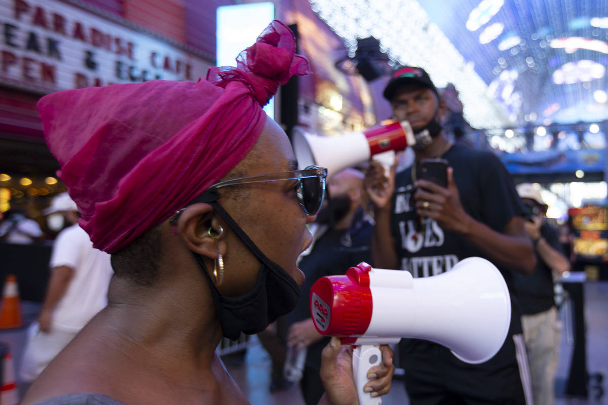 Keke Bolton chants through a megaphone during the "Justice For Breonna Taylor and the Las ...