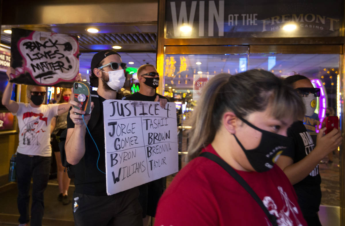 Protesters in the "Justice For Breonna Taylor and the Las Vegas Victims of Police Terroris ...