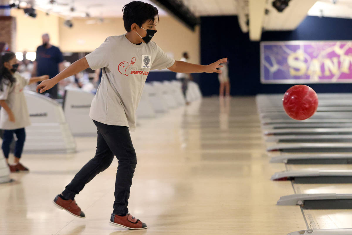 Angel Garcia, 10, bowls during the Angel Tree Sports Clinic Bowling with Blue event at Santa Fe ...