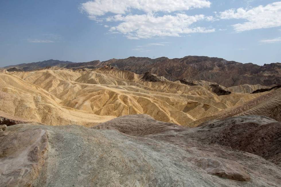 Zabriskie Point at Death Valley National Park, where temperatures reached 127 degrees, on Monda ...