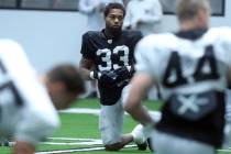 Las Vegas Raiders running back Lynn Bowden Jr. (33) stretches during a practice session at the ...
