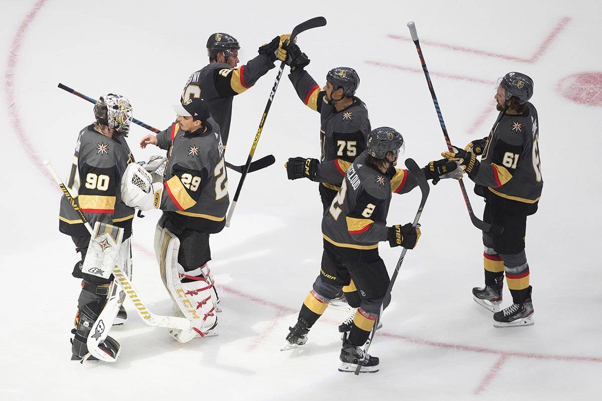 Vegas Golden Knights celebrate a 3-0 win over the Dallas Stars in Game 2 of the NHL hockey West ...