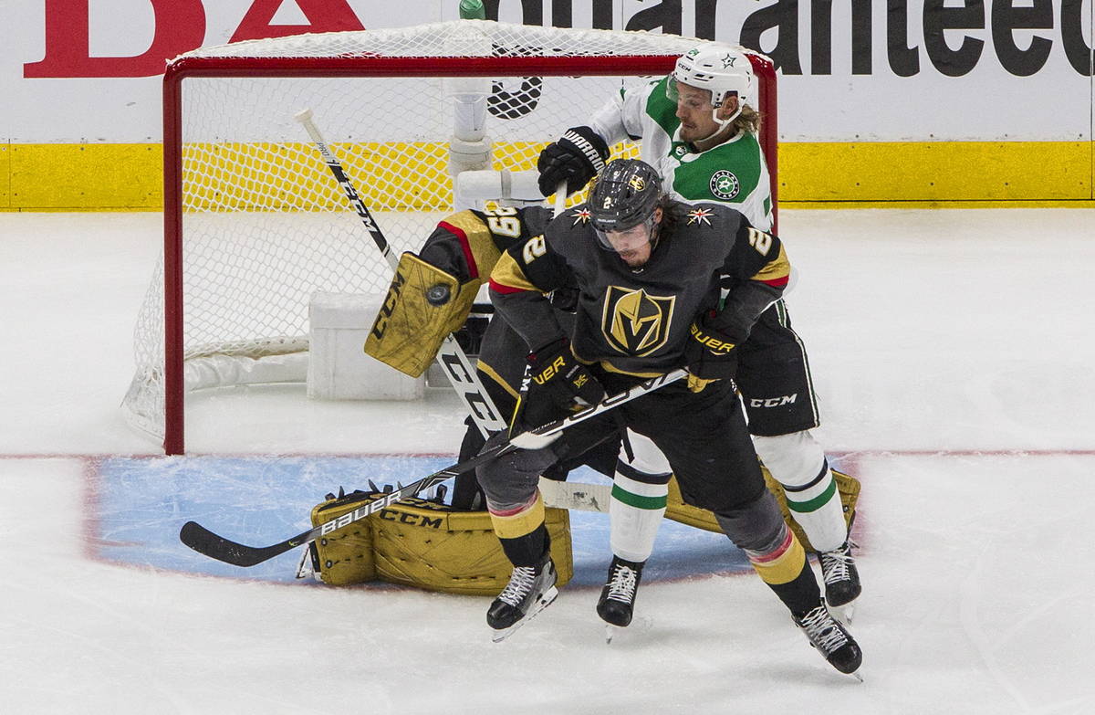 Vegas Golden Knights goalie Marc-Andre Fleury (29) makes a save as Dallas Stars' Roope Hintz (2 ...
