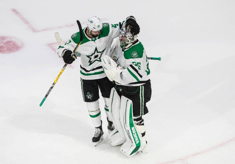 Dallas Stars' Alexander Radulov (47) and goalie Anton Khudobin (35) celebrate their 1-0 win ove ...