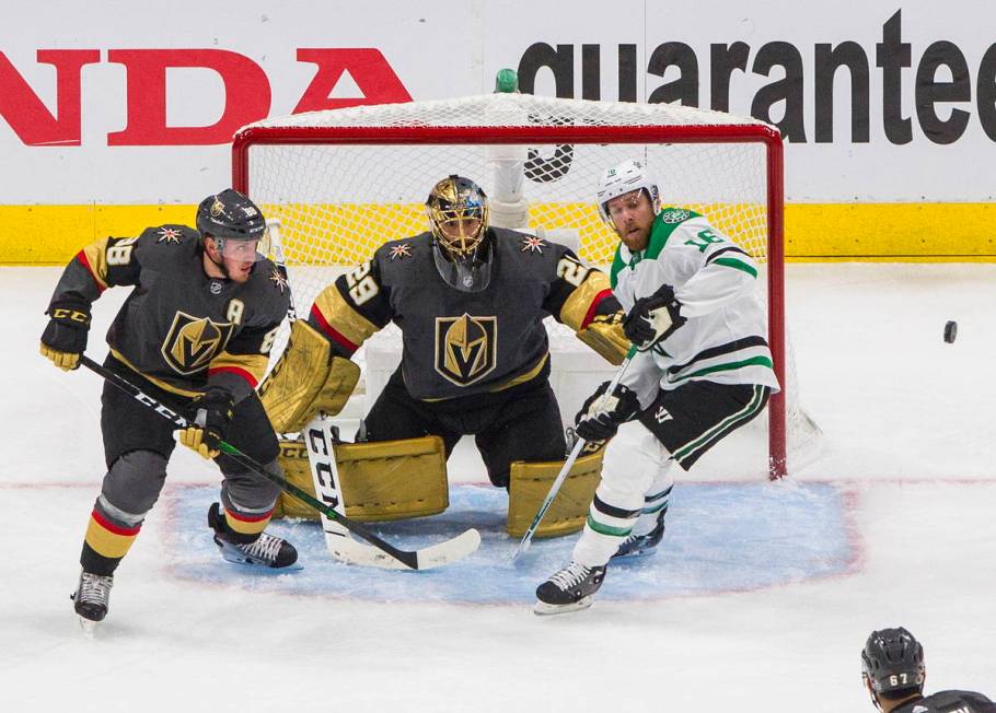 Vegas Golden Knights goalie Marc-Andre Fleury (29) makes the save on Dallas Stars' Joe Pavelski ...