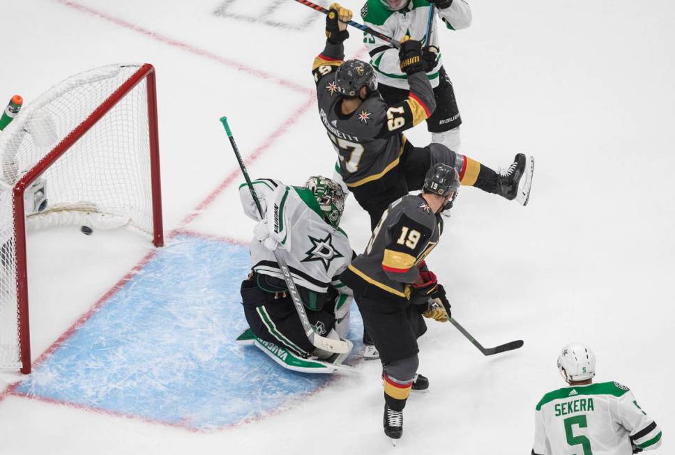 Dallas Stars goalie Anton Khudobin (35) gives up an apparent goal as Vegas Golden Knights' Max ...