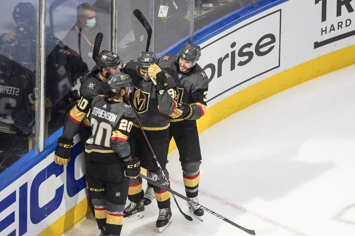 The Vegas Golden Knights' Tomas Nosek (92) celebrates a goal with teammates during the second p ...