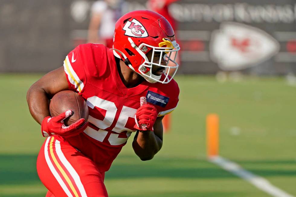 Kansas City Chiefs running back Clyde Edwards-Helaire runs the ball during an NFL football trai ...