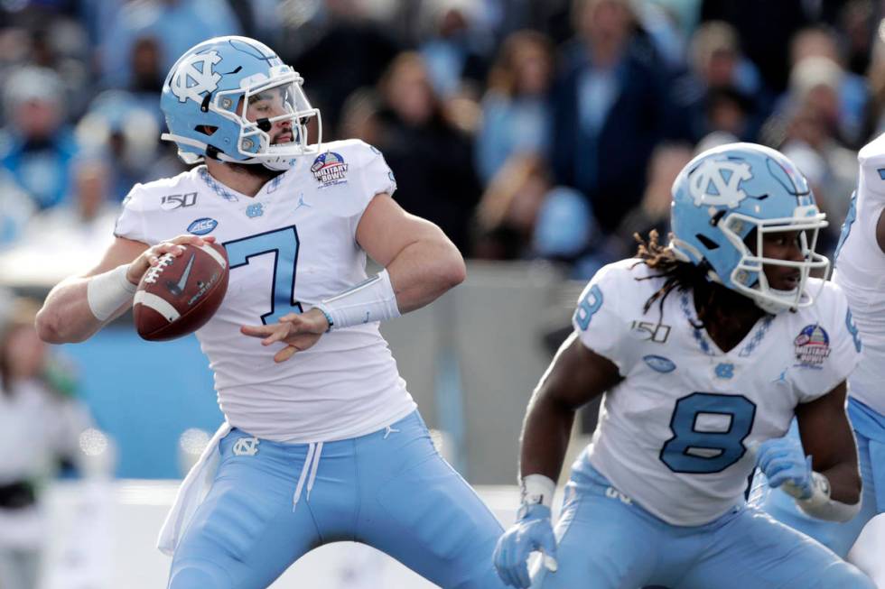 North Carolina quarterback Sam Howell throws a touchdown pass to wide receiver Dyami Brown duri ...