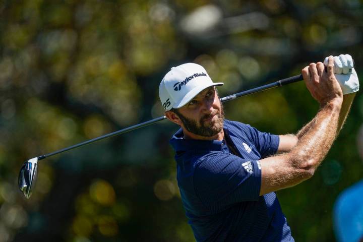 Dustin Johnson hits his tee shot on the fifth hole during the final round of the Tour Champions ...