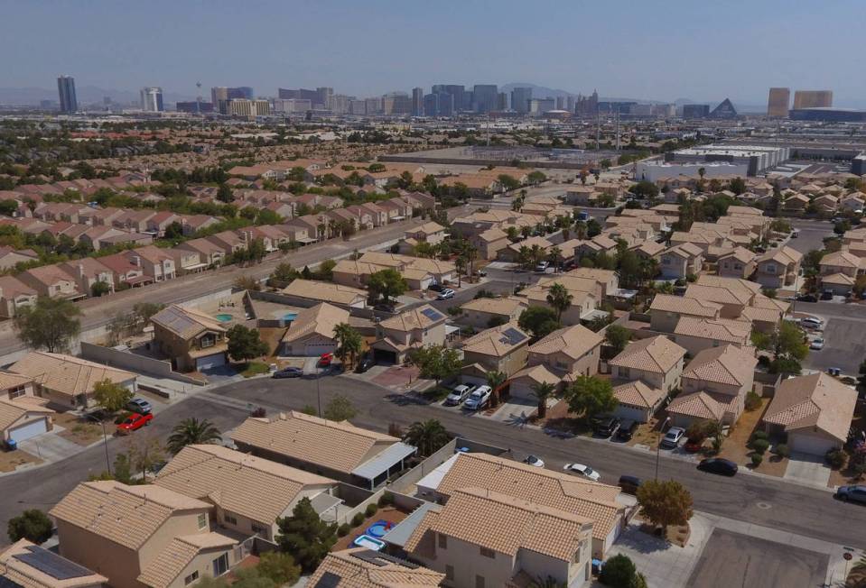 An aerial photo shows home on Dewey Drive and Autumn Cliff Way near Jones Boulevard on Tuesday, ...