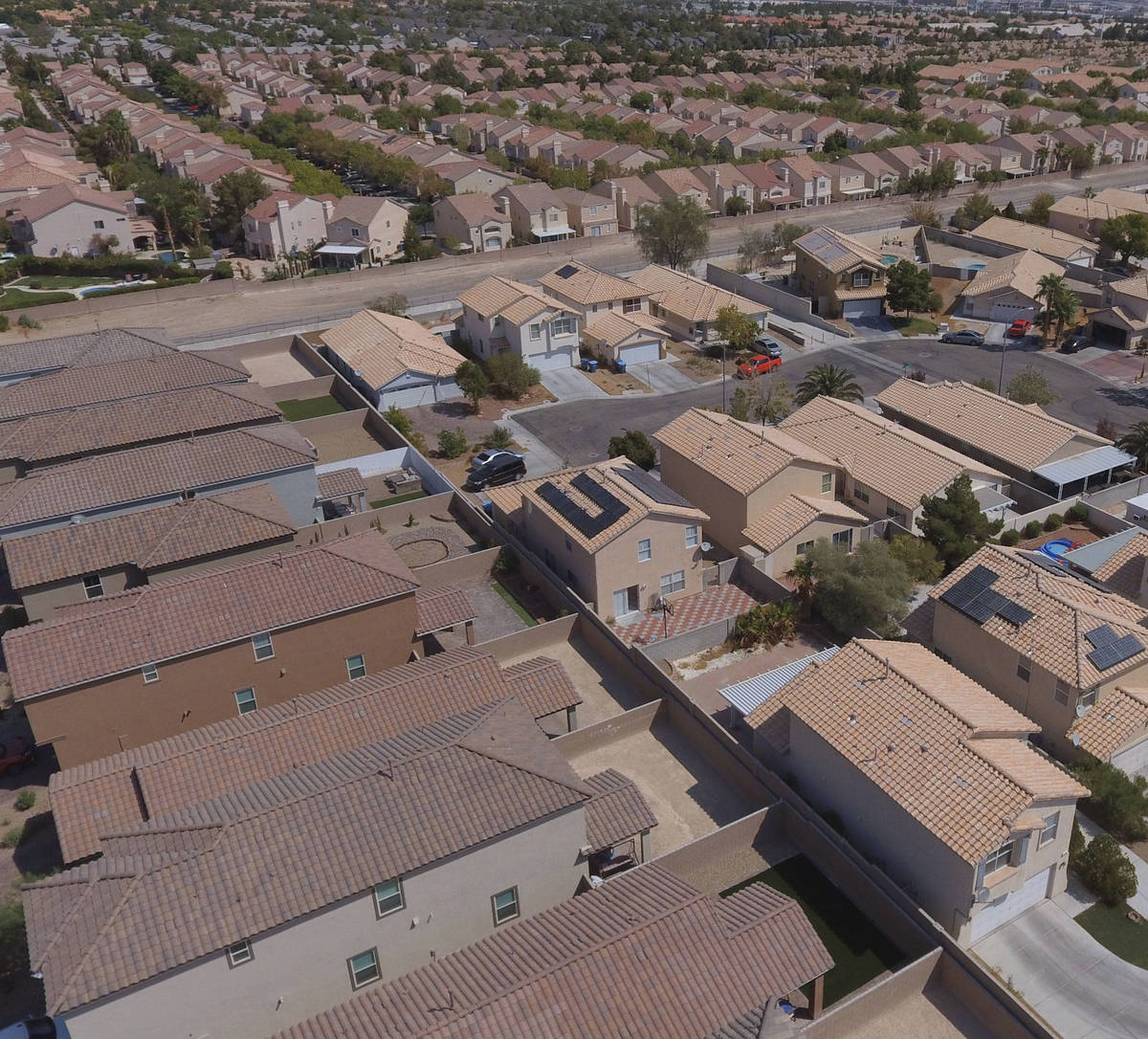 An aerial photo shows home on Dewey Drive and Autumn Cliff Way near Jones Boulevard on Tuesday, ...