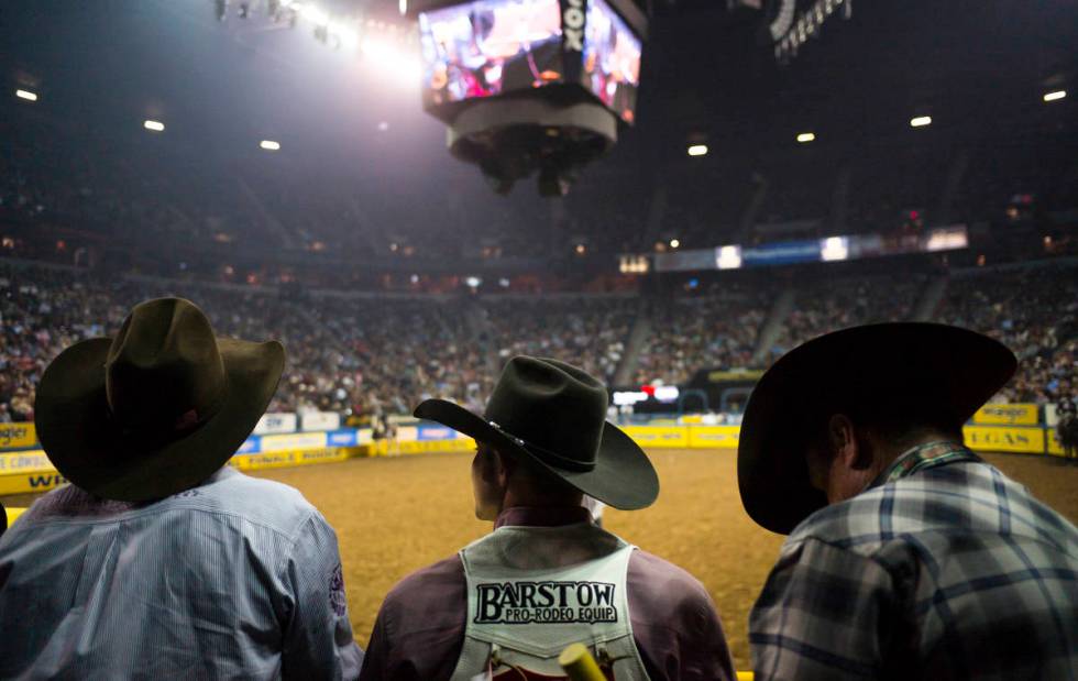 FILE - In this Dec. 8, 2017, file photo, contestants and officials watch competitors in the bar ...