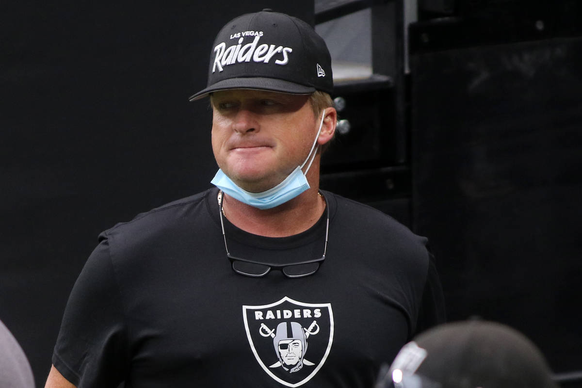 Las Vegas Raiders head coach Jon Gruden watches warm ups during a team practice at Allegiant St ...