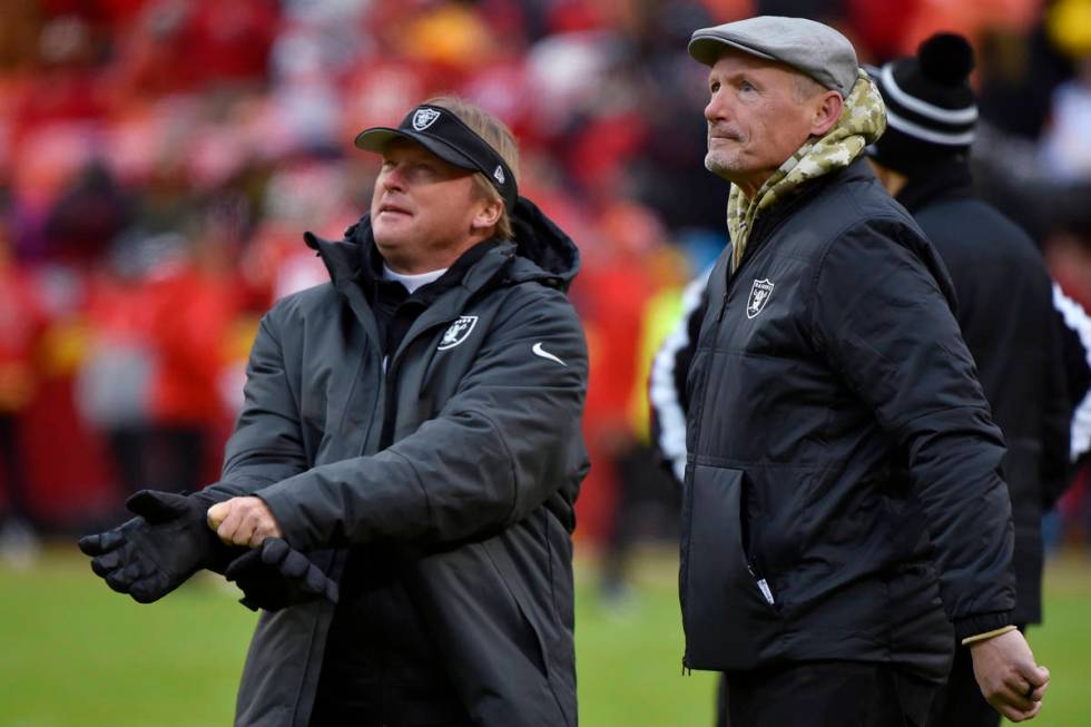 n this Dec. 1, 2019, file photo, Oakland Raiders general manager Mike Mayock stands with coach ...