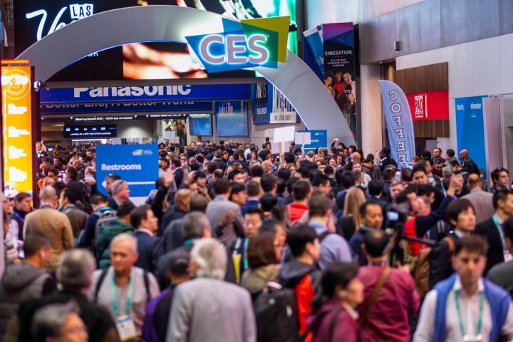 Attendees gather outside of the main entrance for Central Hall as CES Day 1 is about to open at ...