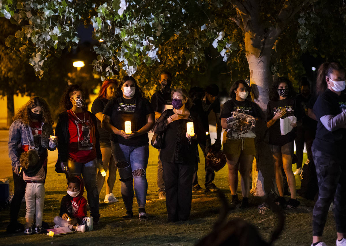 Families who have lost loved ones to police violence, including Jackie Lawrence, second from le ...