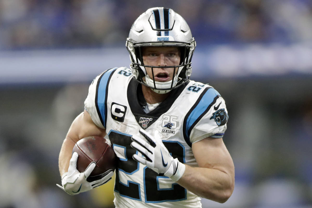 FILE - In this Dec. 22, 2019, file photo, Carolina Panthers' Christian McCaffrey runs during th ...