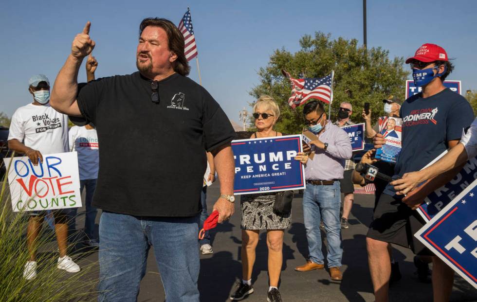 Michael McDonald fires up protestors gathered at the Grant Sawyer building to voice opposition ...