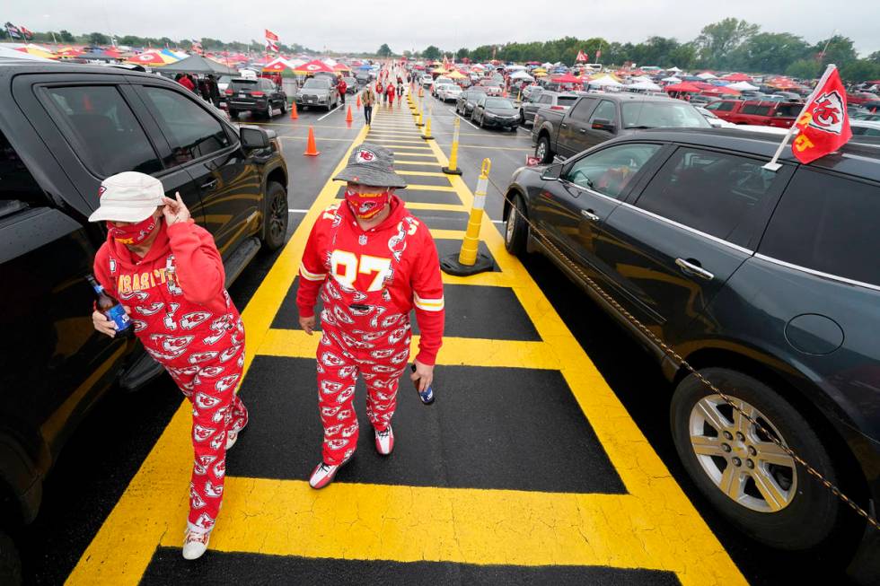 Fans arrive at Arrowhead Stadium before an NFL football game between the Kansas City Chiefs and ...