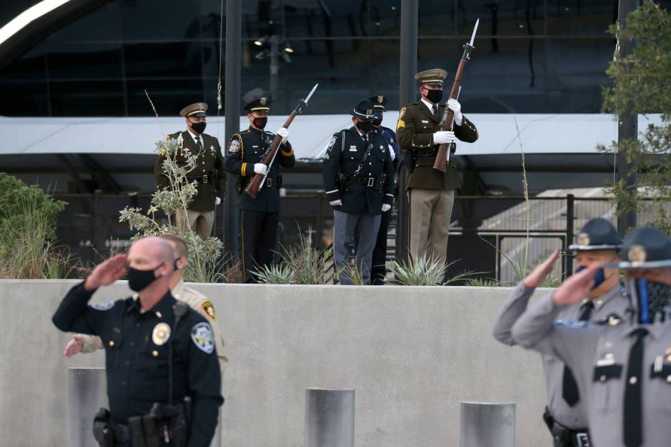 A multi-agency honor guard present the colors during a 9/11 ceremony at Allegiant Stadium in La ...