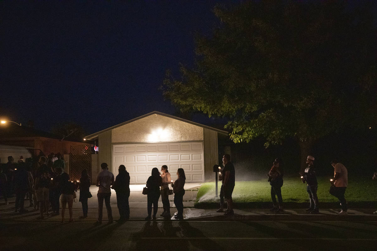 A vigil is held for Lesly Palacio's mother's home in Las Vegas on Thursday, Sept. 10, 2020. (El ...
