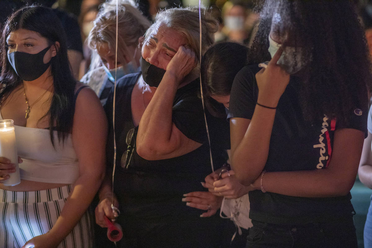 Aracely Palacio, center, mourns the death of her daughter Lesly Palacio, as sister Karely Pala ...