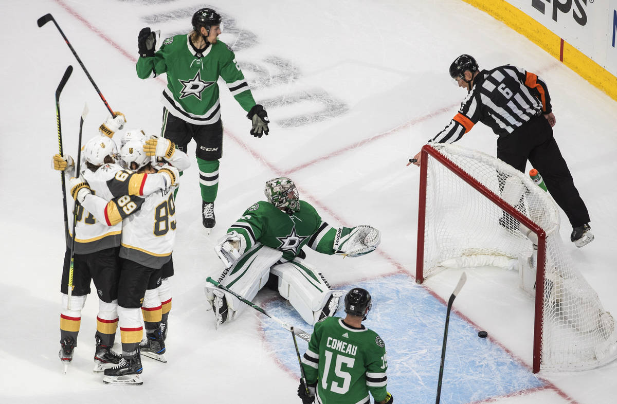 Dallas Stars goalie Anton Khudobin (35) looks to the official as the Vegas Golden Knights celeb ...