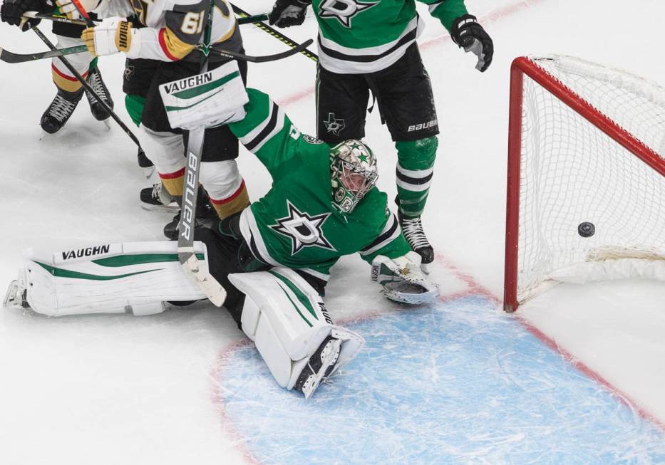 Dallas Stars goalie Anton Khudobin (35) gives up a goal to Vegas Golden Knights' Alex Tuch duri ...