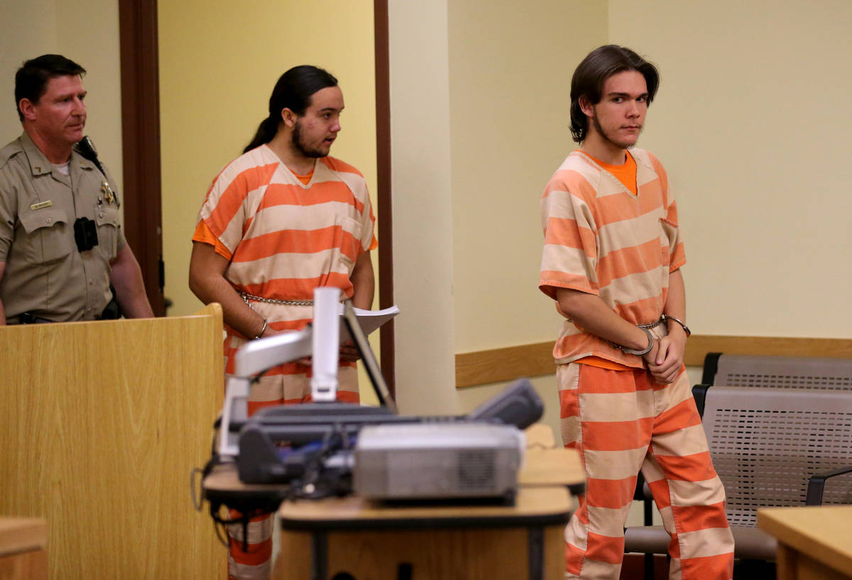Brothers Michael Wilson, right, and Dakota Saldivar arrive in the courtroom for a preliminary h ...