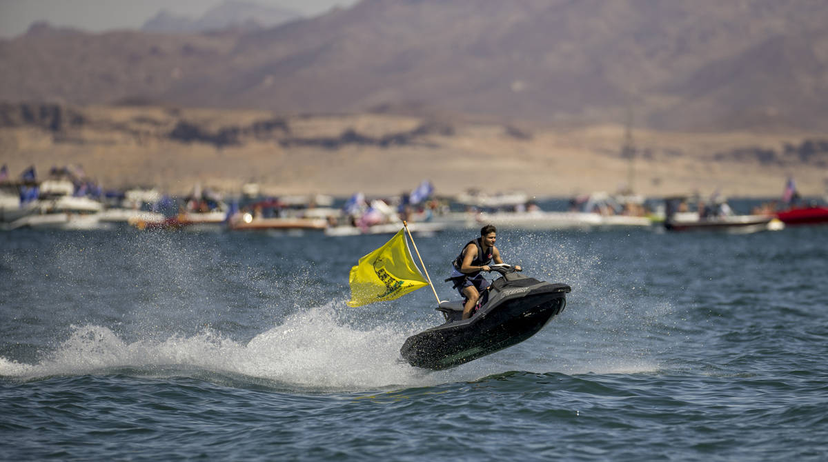 A jet skier catches some air as he participates in the President Donald Trump boat parade on La ...