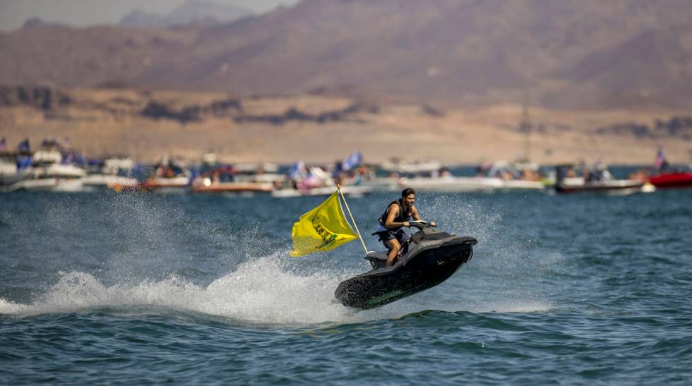 A jet skier catches some air as he participates in the President Donald Trump boat parade on La ...