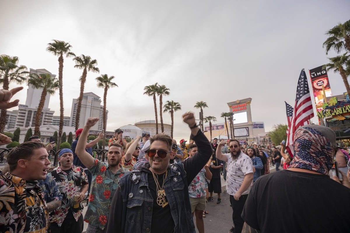 Individuals chant “Four more years,” on the Las Vegas Strip on Friday, Sept. 11, 2020. (Eli ...