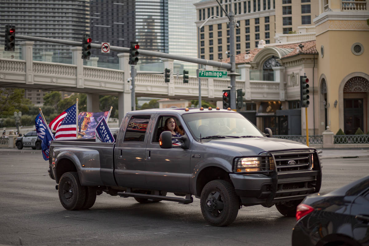 A truck participating in a caravan rally for Make Nevada Red, and Fight for Nevada, drives down ...