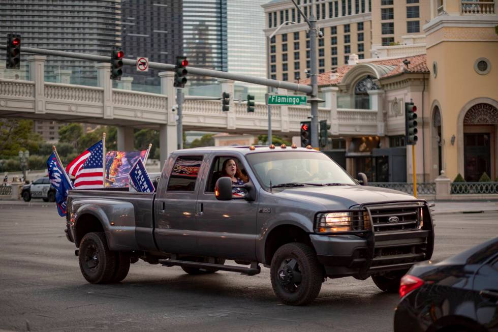 A truck participating in a caravan rally for Make Nevada Red, and Fight for Nevada, drives down ...