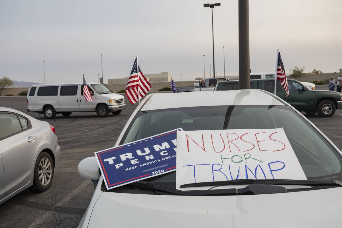 A car is seen declaring nurses for Trump at the Fryer's parking lot located near Town Square, i ...