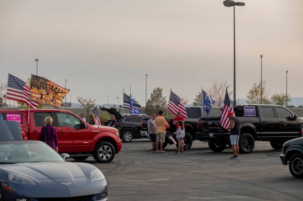 Vehicles participating in a caravan rally for Make Nevada Red, and Fight for Nevada, are parked ...