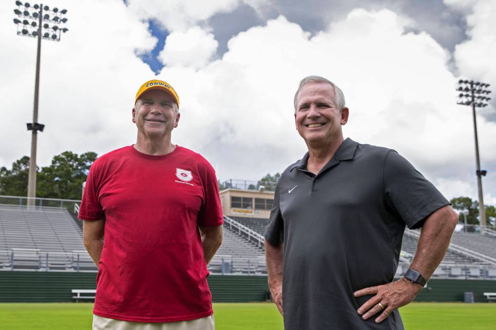 Tim Renfrow, right, father of Raiders wide receiver Hunter Renfrow, and Chuck Jordan, former hi ...