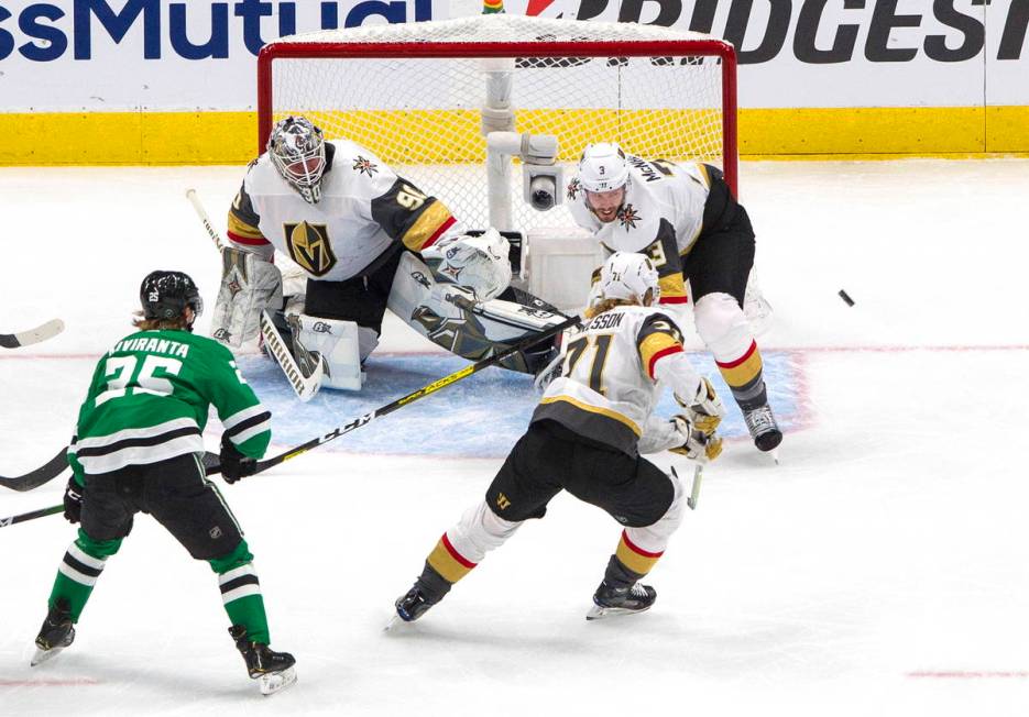 Dallas Stars' Joel Kiviranta (25) looks for the rebound from Vegas Golden Knights goalie Robin ...