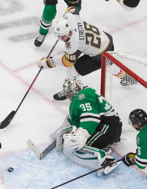 Dallas Stars goalie Anton Khudobin (35) makes the save on Vegas Golden Knights' Paul Stastny (2 ...