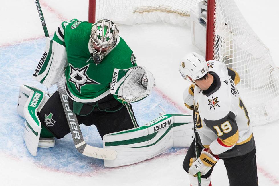 Dallas Stars goalie Anton Khudobin makes a save on Vegas Golden Knights' Reilly Smith (19) duri ...