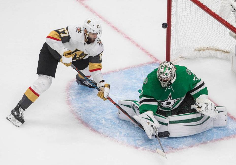 Dallas Stars goalie Anton Khudobin (35) makes a save on Vegas Golden Knights' Max Pacioretty (6 ...