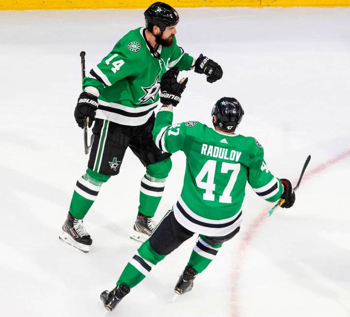 Dallas Stars' Jamie Benn (14) celebrates his goal against the Vegas Golden Knights with teammat ...