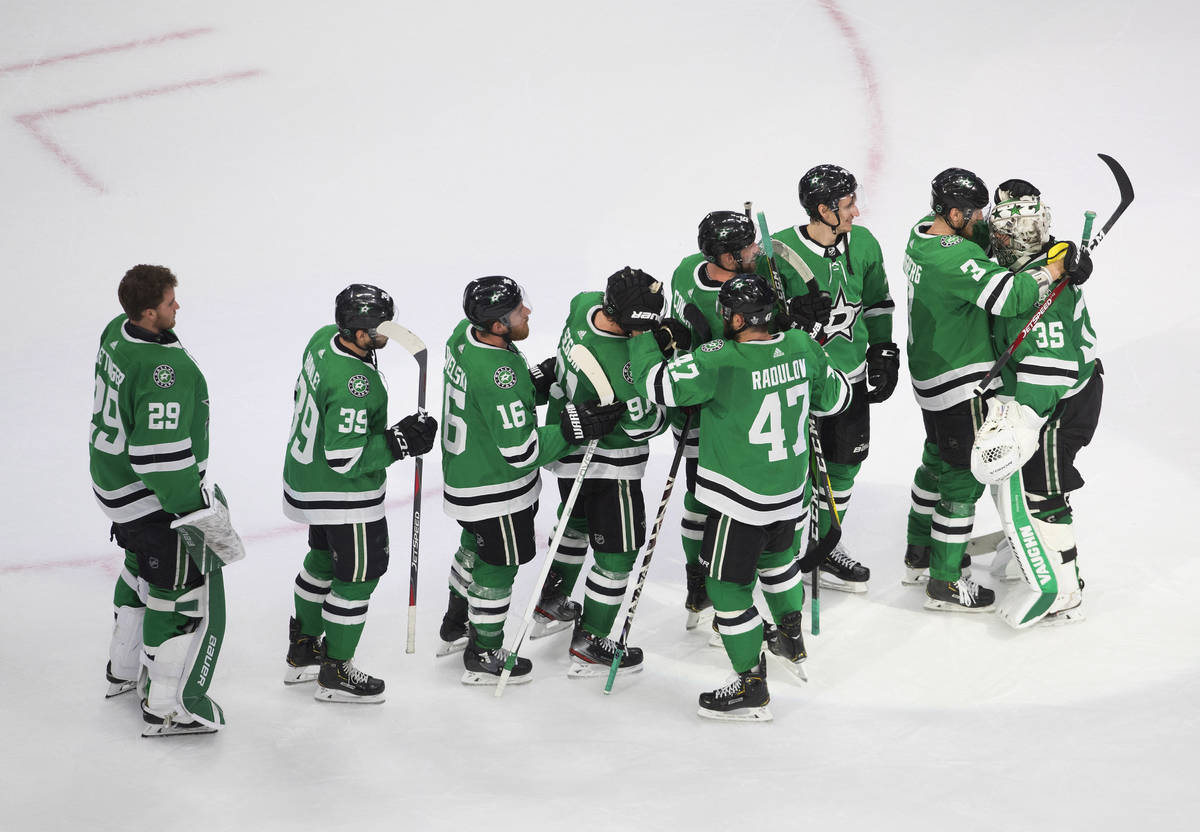 Dallas Stars goalie Anton Khudobin (35) and teammates celebrate a win over the Vegas Golden Kni ...