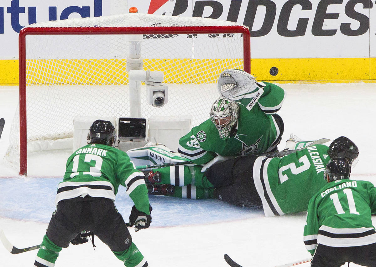 Dallas Stars goalie Anton Khudobin (35) makes a save against the Vegas Golden Knights as Stars ...